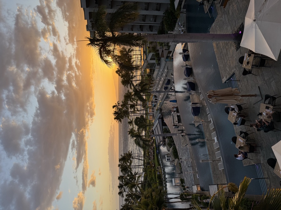 Sunset over the pools at a 5-star Hyatt resort